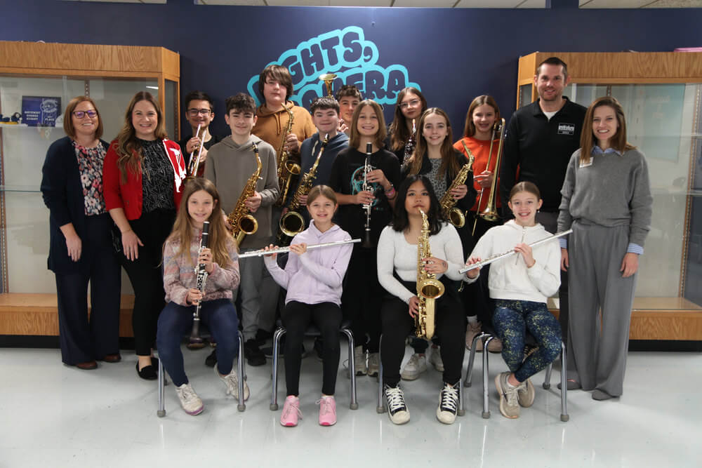St. Louis Music donates band instruments to a local middle school